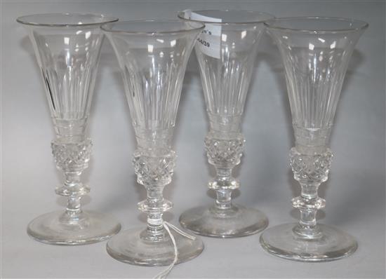 A set of four late Victorian cut glass conical glasses	 15cm